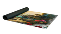 A rectangular mat with a detailed landscape print, partially unrolled from a black rolled-up end