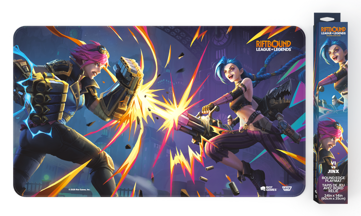 Riftbound: Vendetta bound-edge playmat showing Vi and Jinx trading fire, with its retail box alongside